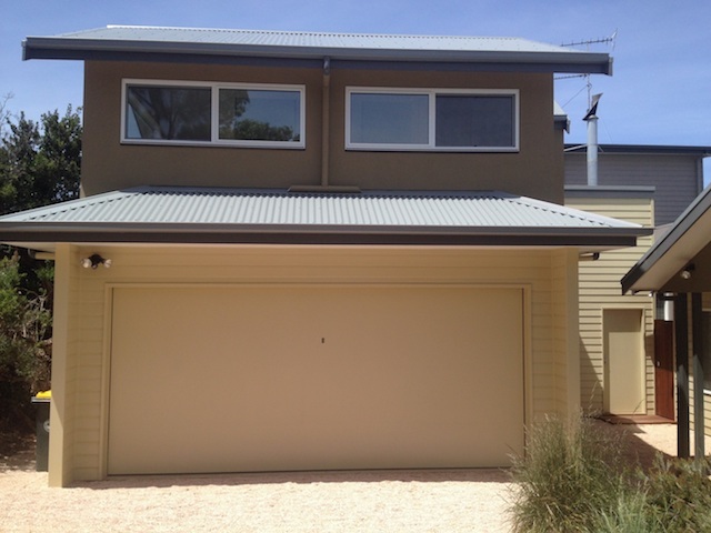 Recessed ply custom tilt garage door.